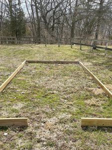 Wooden U frame on ground