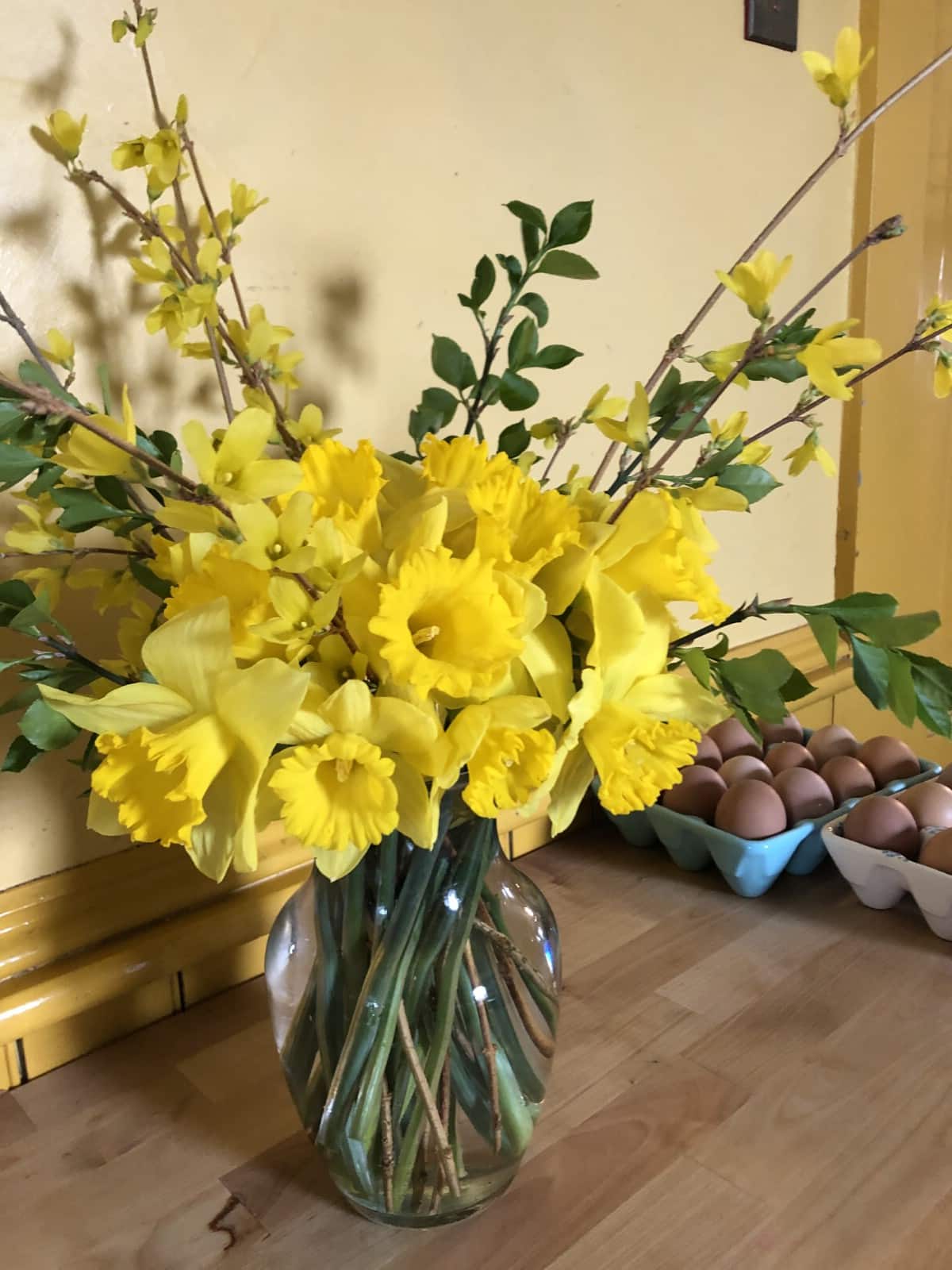 daffodil flower arrangement with filler greens