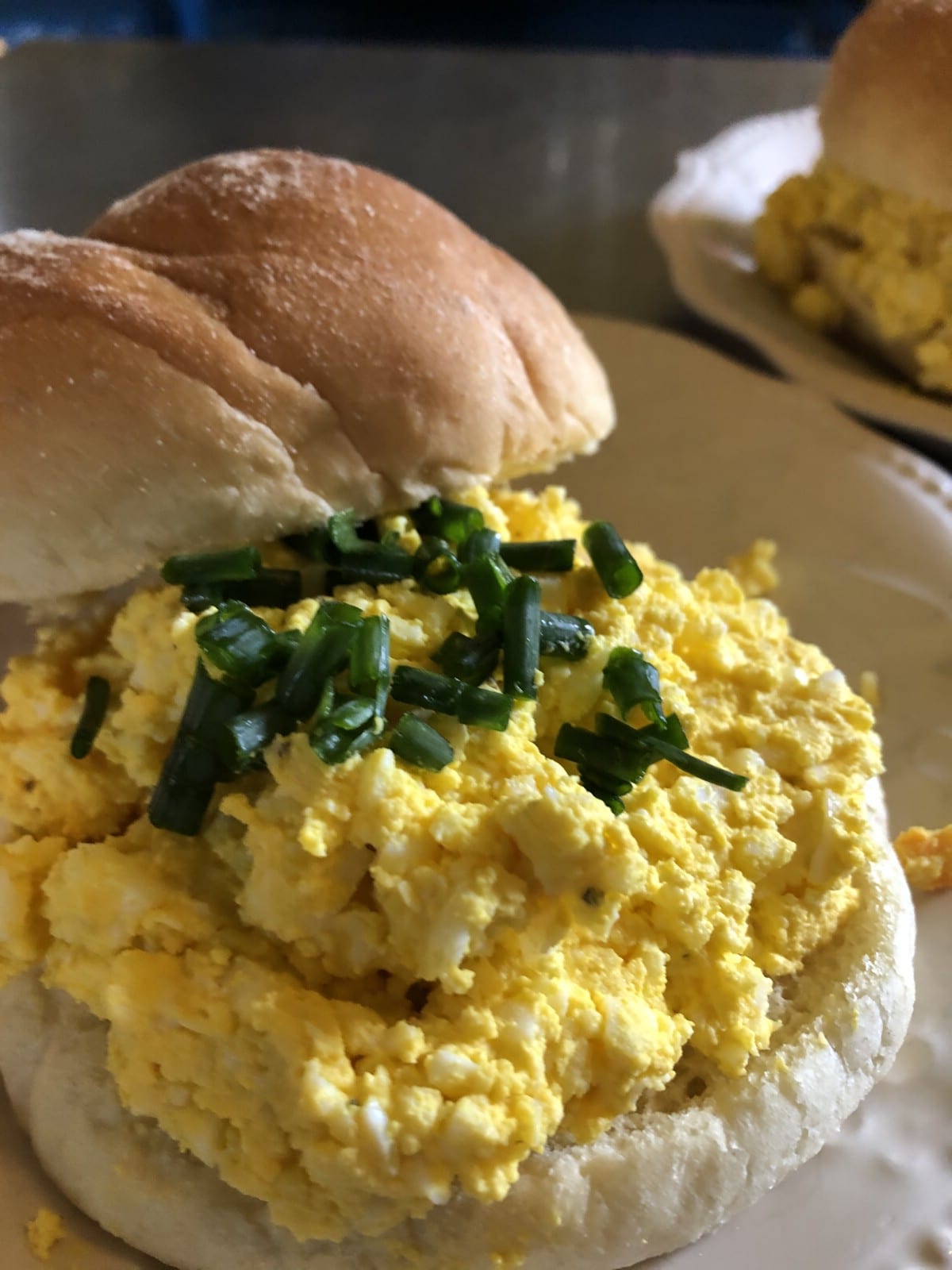 trimmed onion tops on egg salad