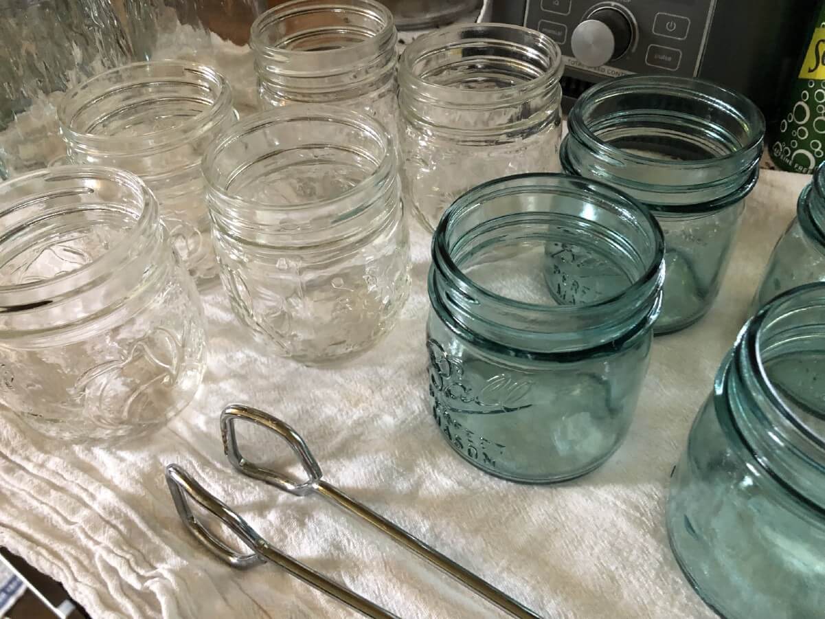 canning jars on cotton towel