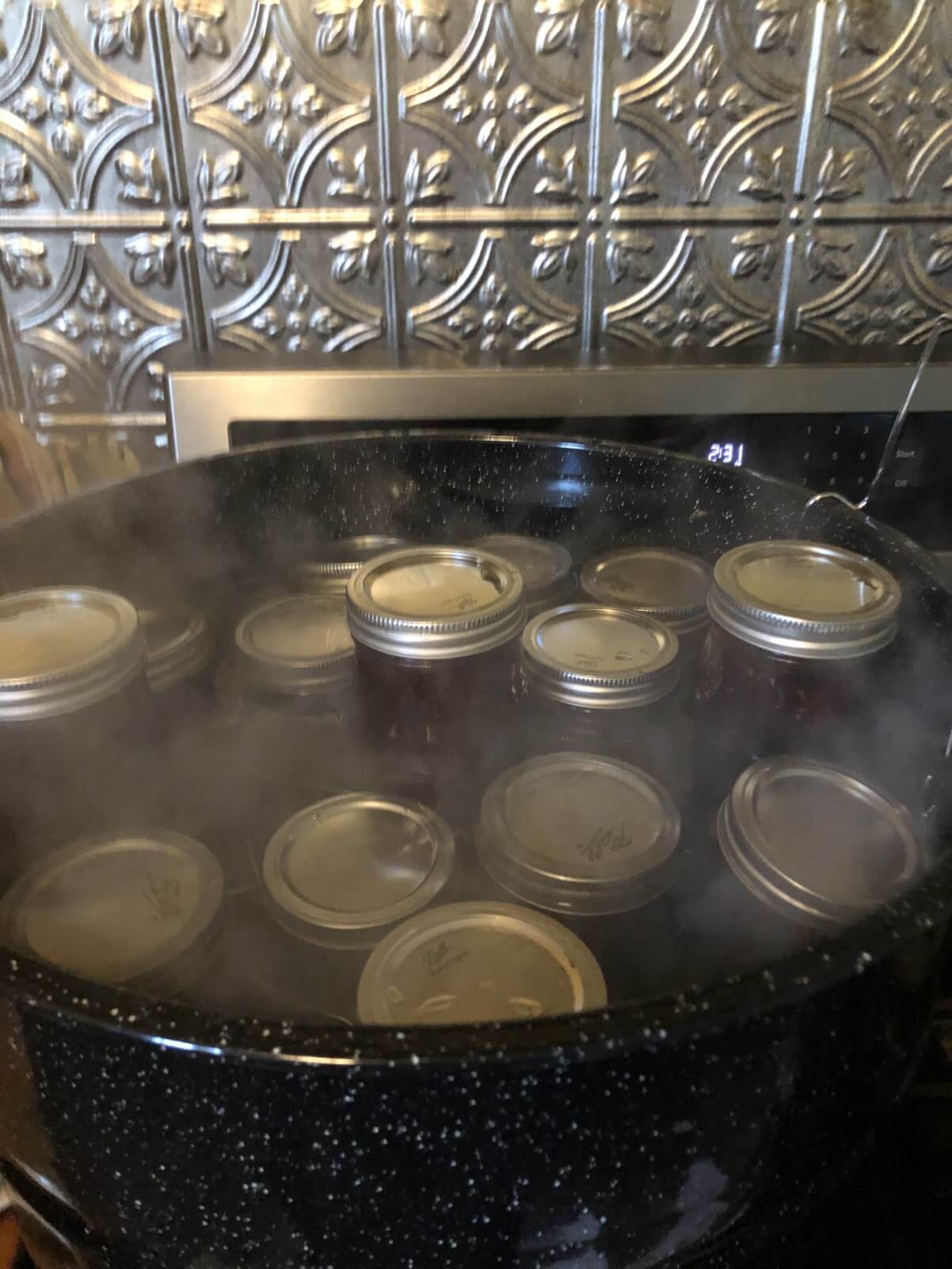 jam jars loaded in canner