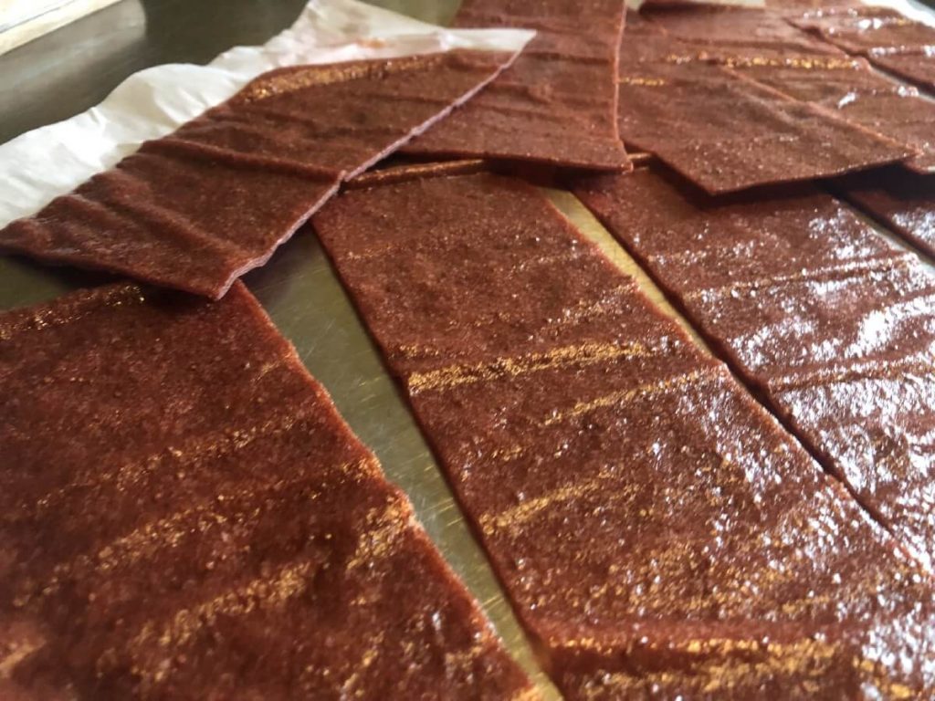 Prepared strawberry fruit leather cut into strips