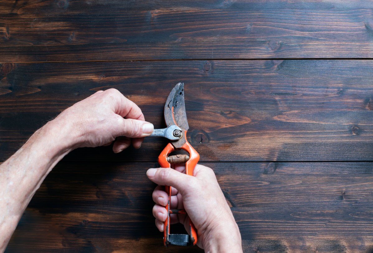 tightening pruner nut with a wrench