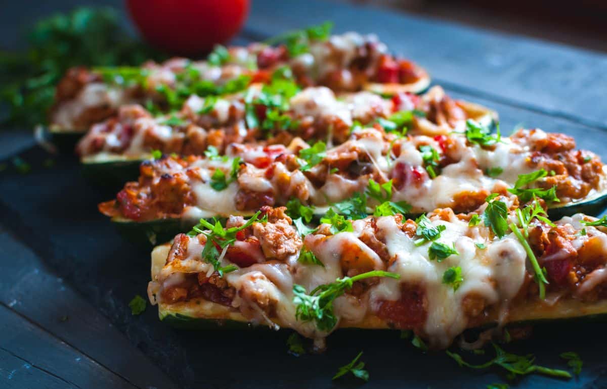 Stuffed zucchini boats topped with cheese
