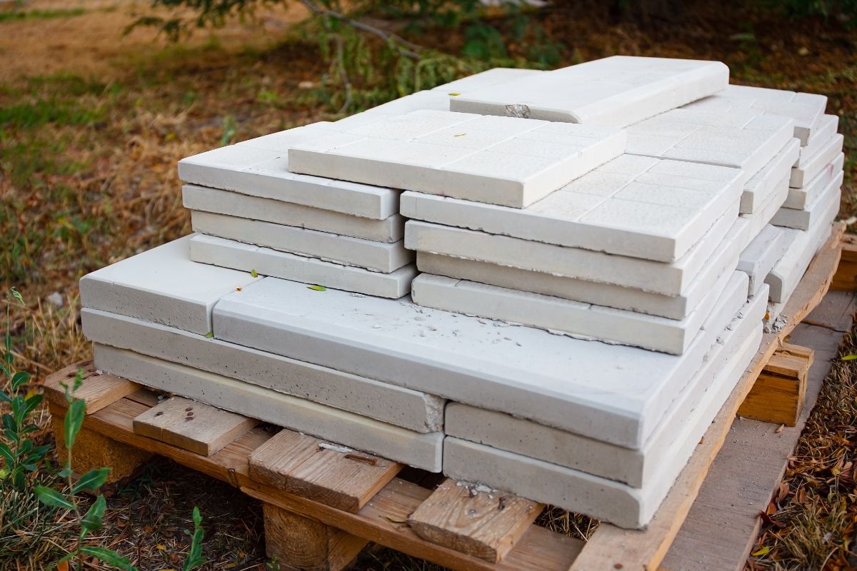 A pile of pre-cut stone tiles perfect for building a DIY stone planter