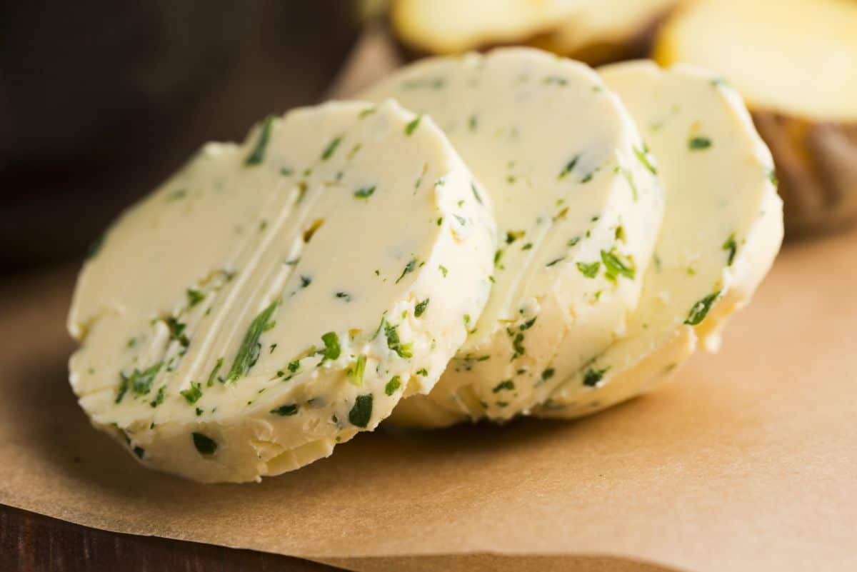 Shredded zucchini used to make a flavored compound butter