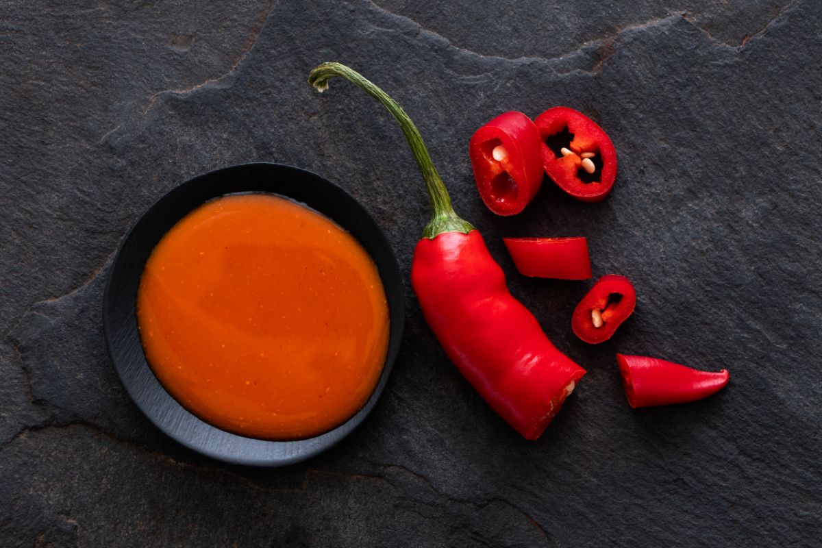 Long, red peri peri peppers have a smoky, peachy flavor