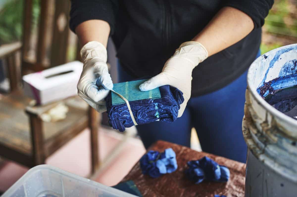 A do-it-yourselfer makes deep blue cloth from natural plant dye