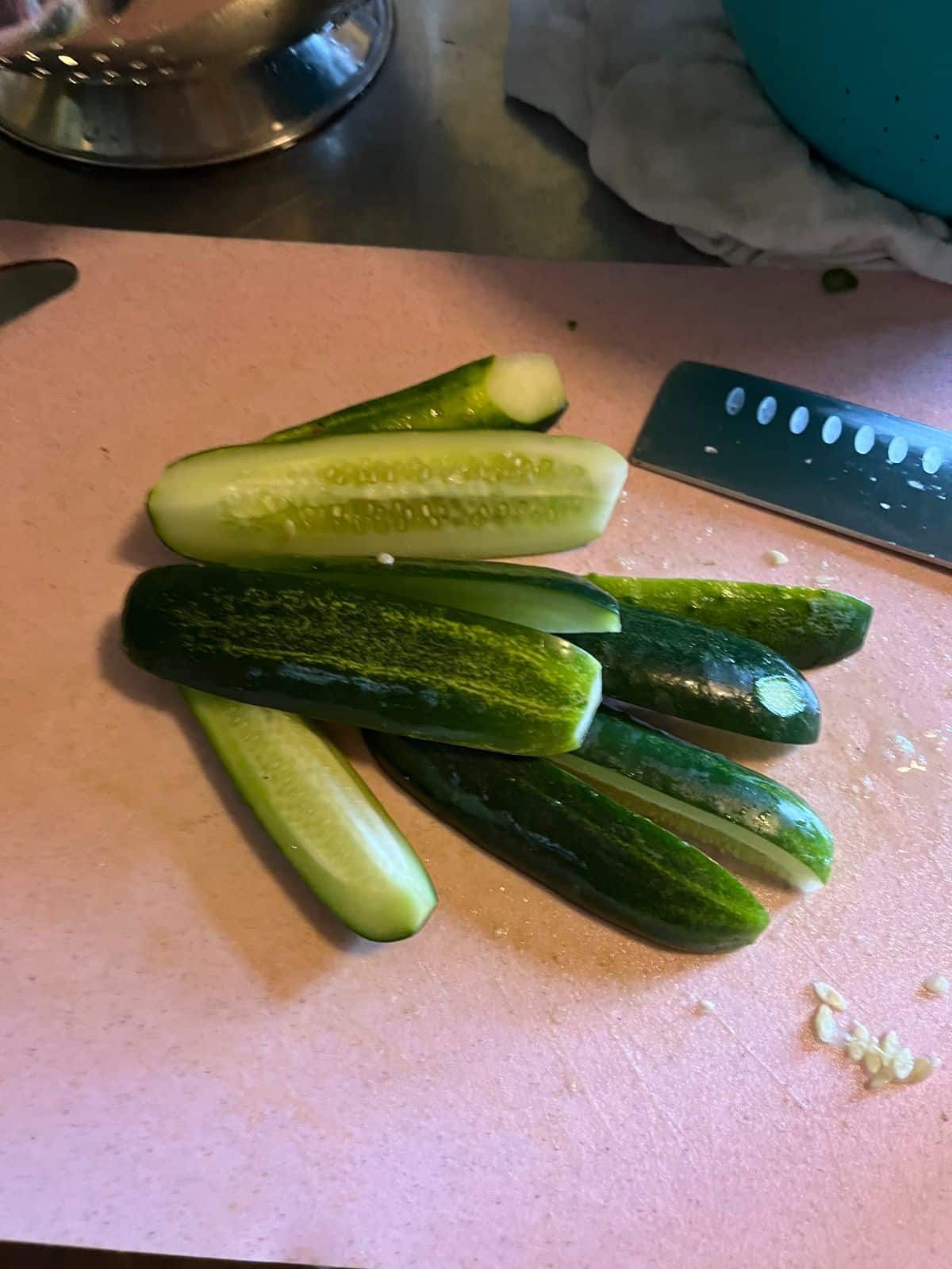 Cucumbers cut up for refrigerator pickles