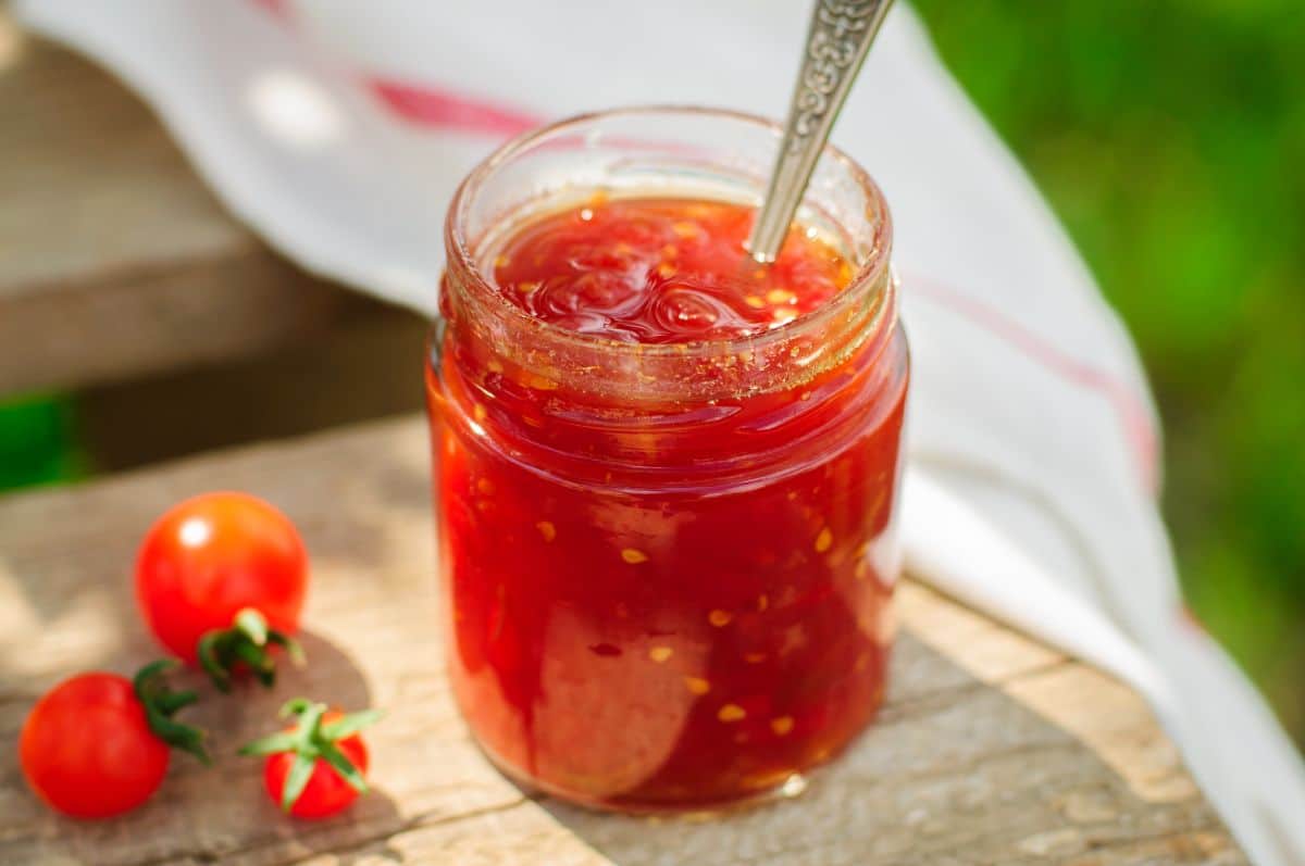 Tomato jelly in a jar is an ideal charcuterie accompaniment