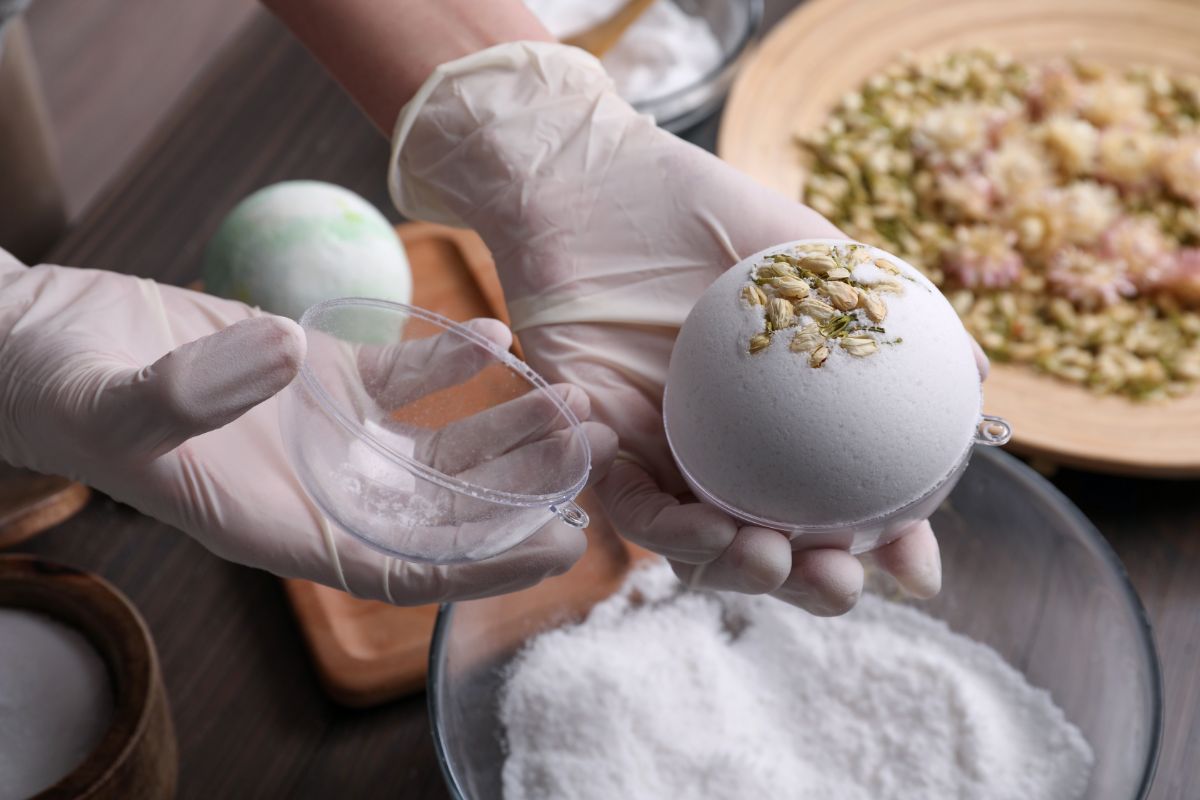 A woman making homemade fizzy bath bombs