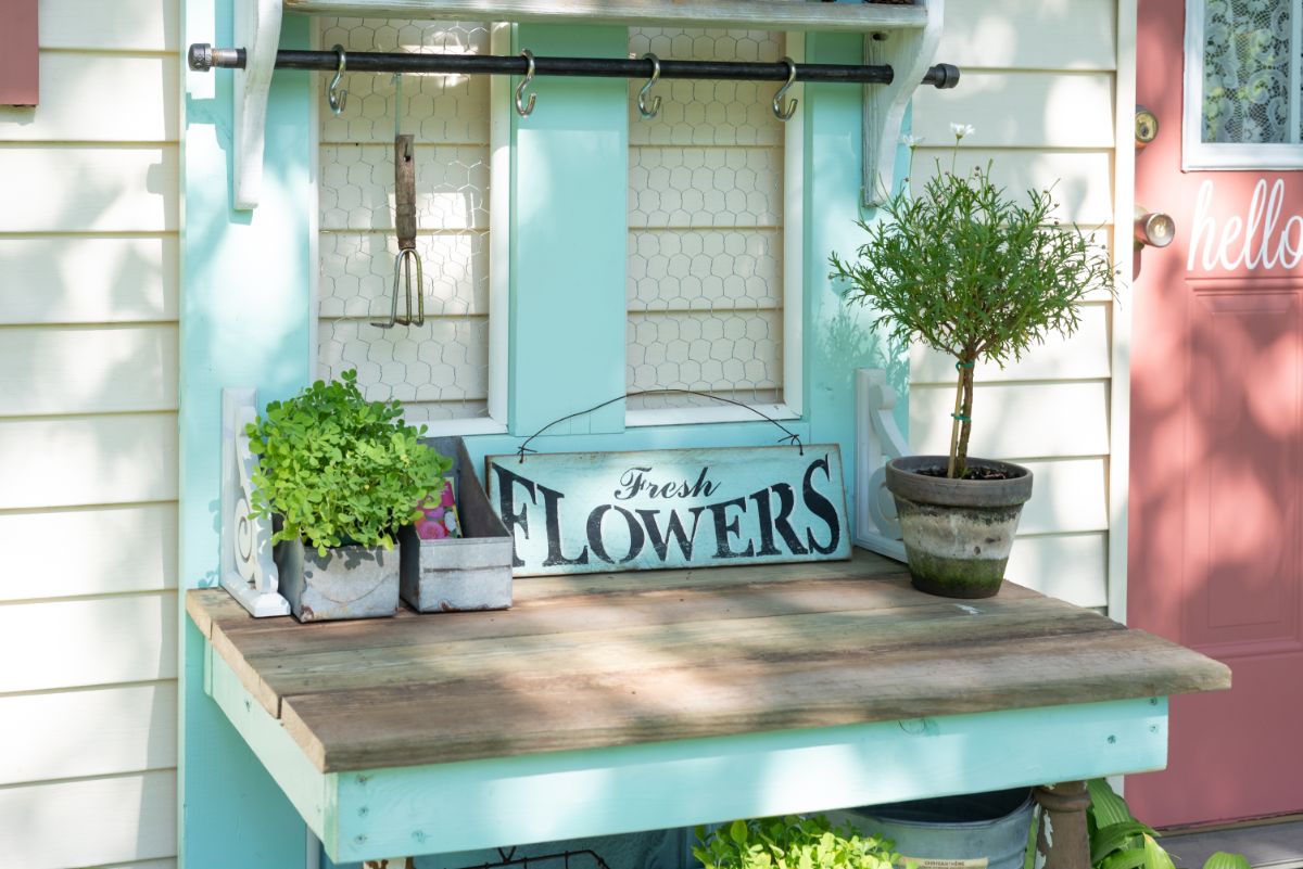 A rustic DIY potting bench