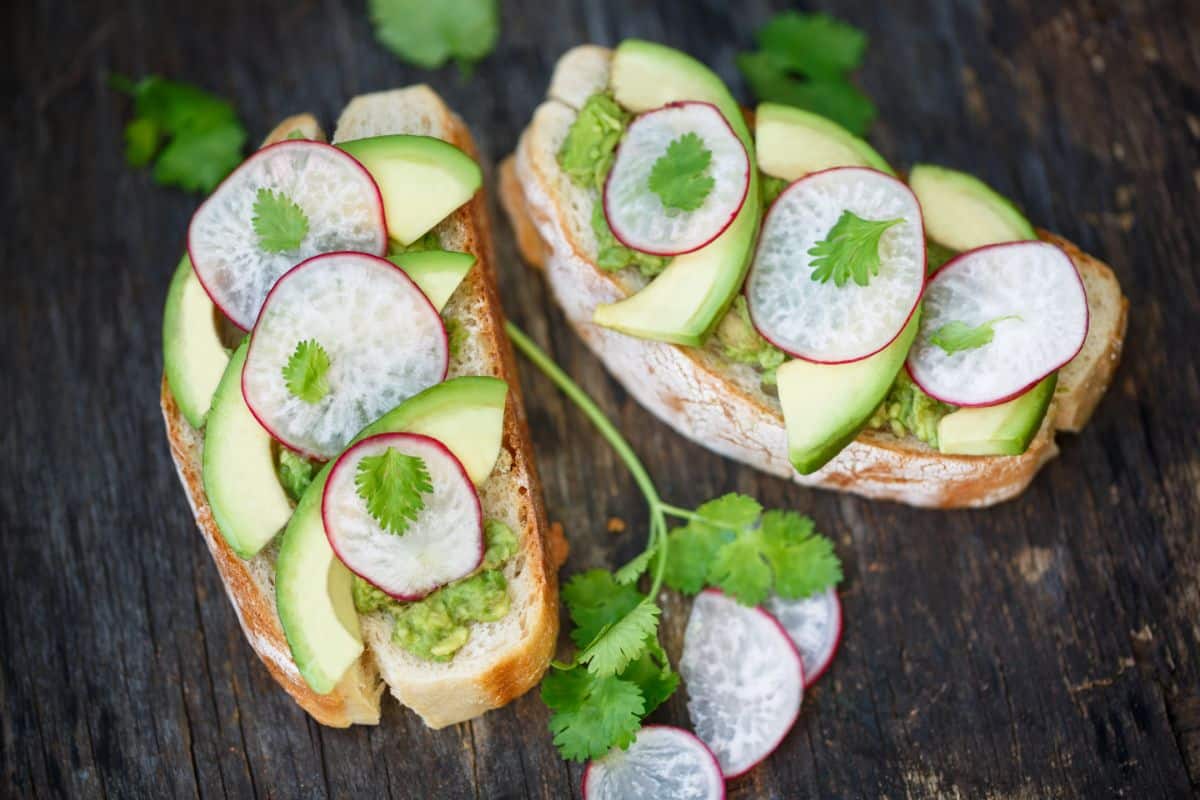 Open-faced fresh French tartine sandwich with radish