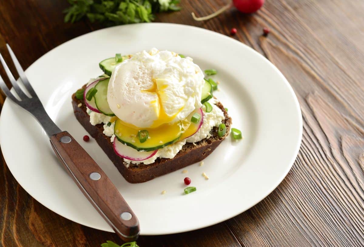 Sauteed radish on a poached egg with herbs