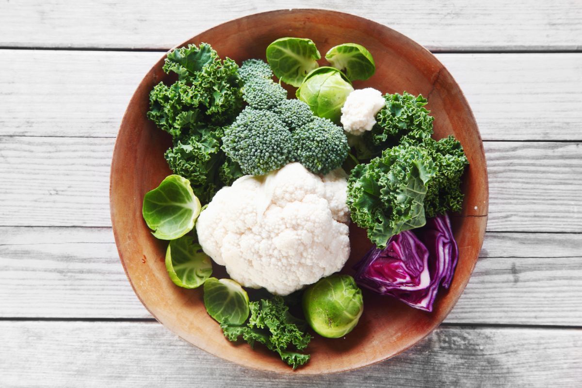 A variety of harvested brassica produce in a bowl