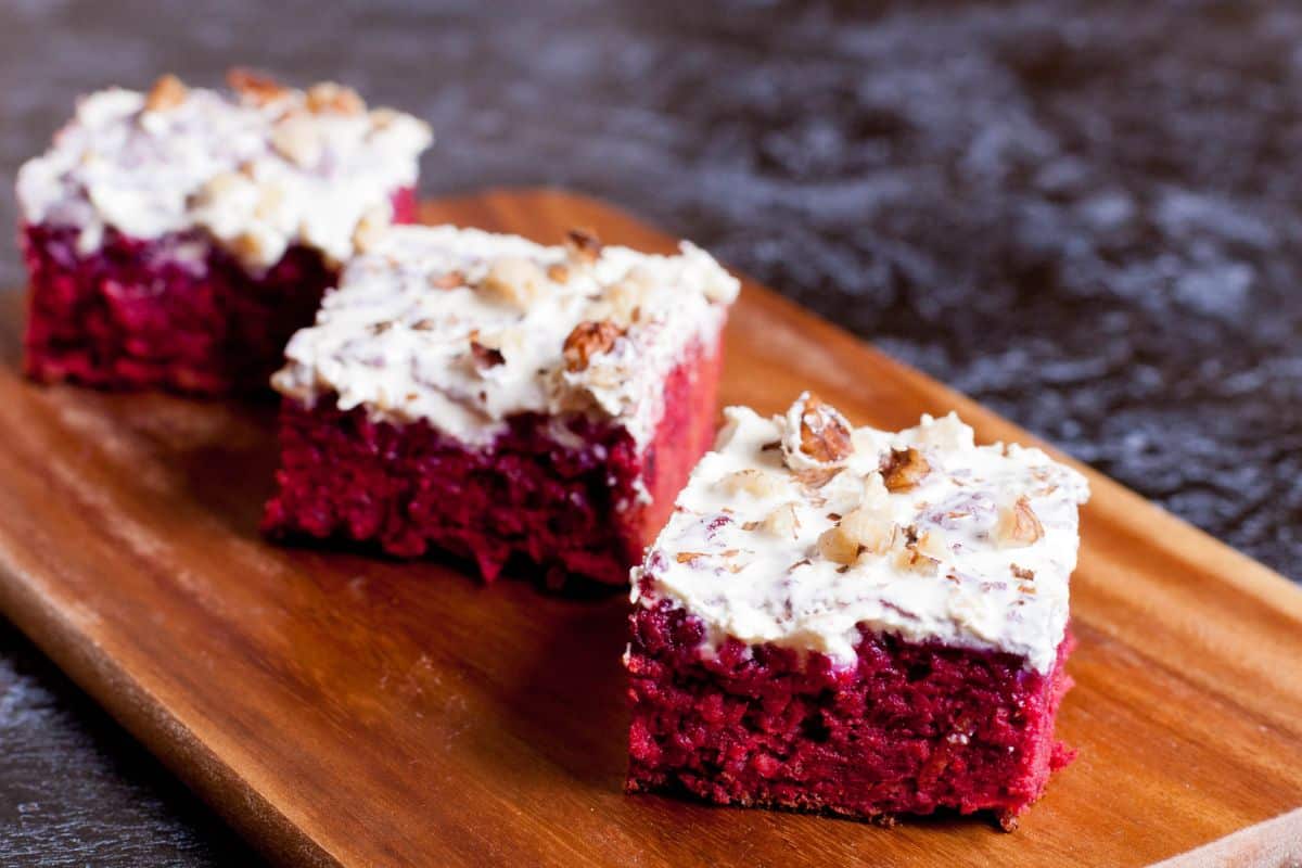 Slices of red velvet cake dyed with beets