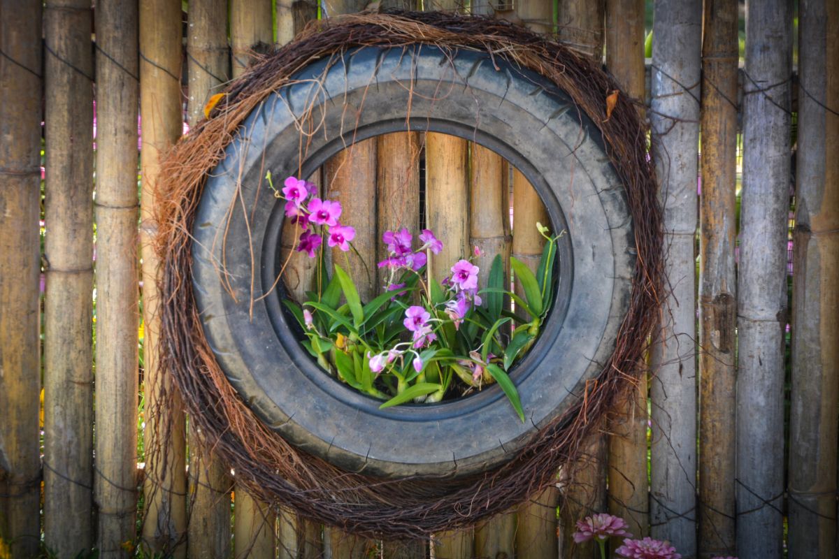 A hanging garden planter built from an old tire