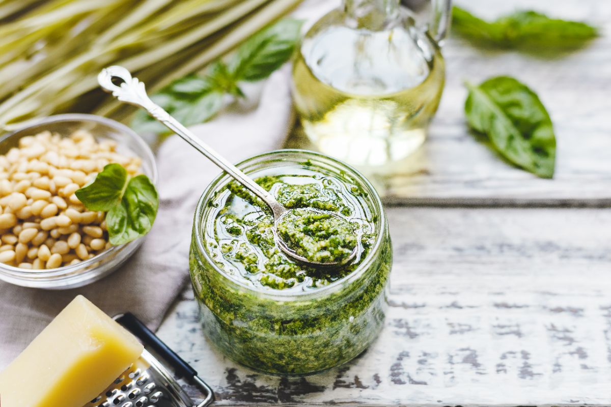 A jar of fresh homemade basil pesto