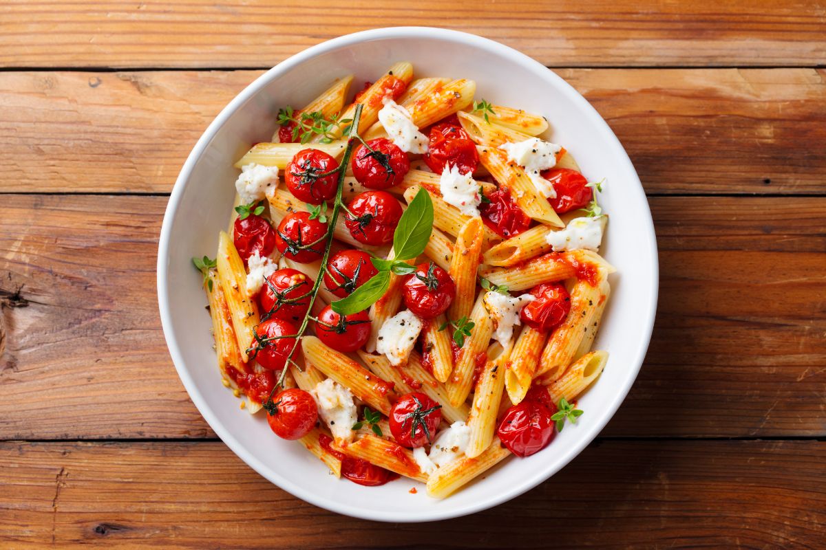 Sauteed cherry tomatoes in a pasta dish