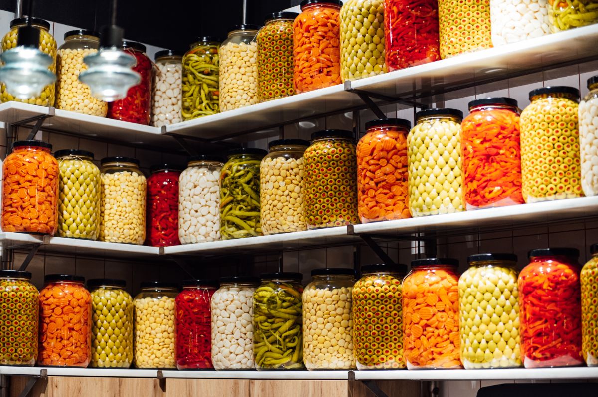 Canned products in a pantry shelf