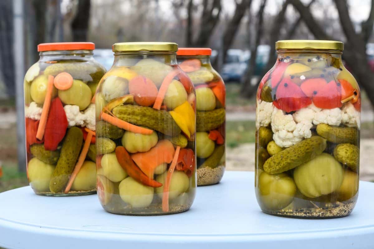 Jars of bright colored Giardiniera vegetables