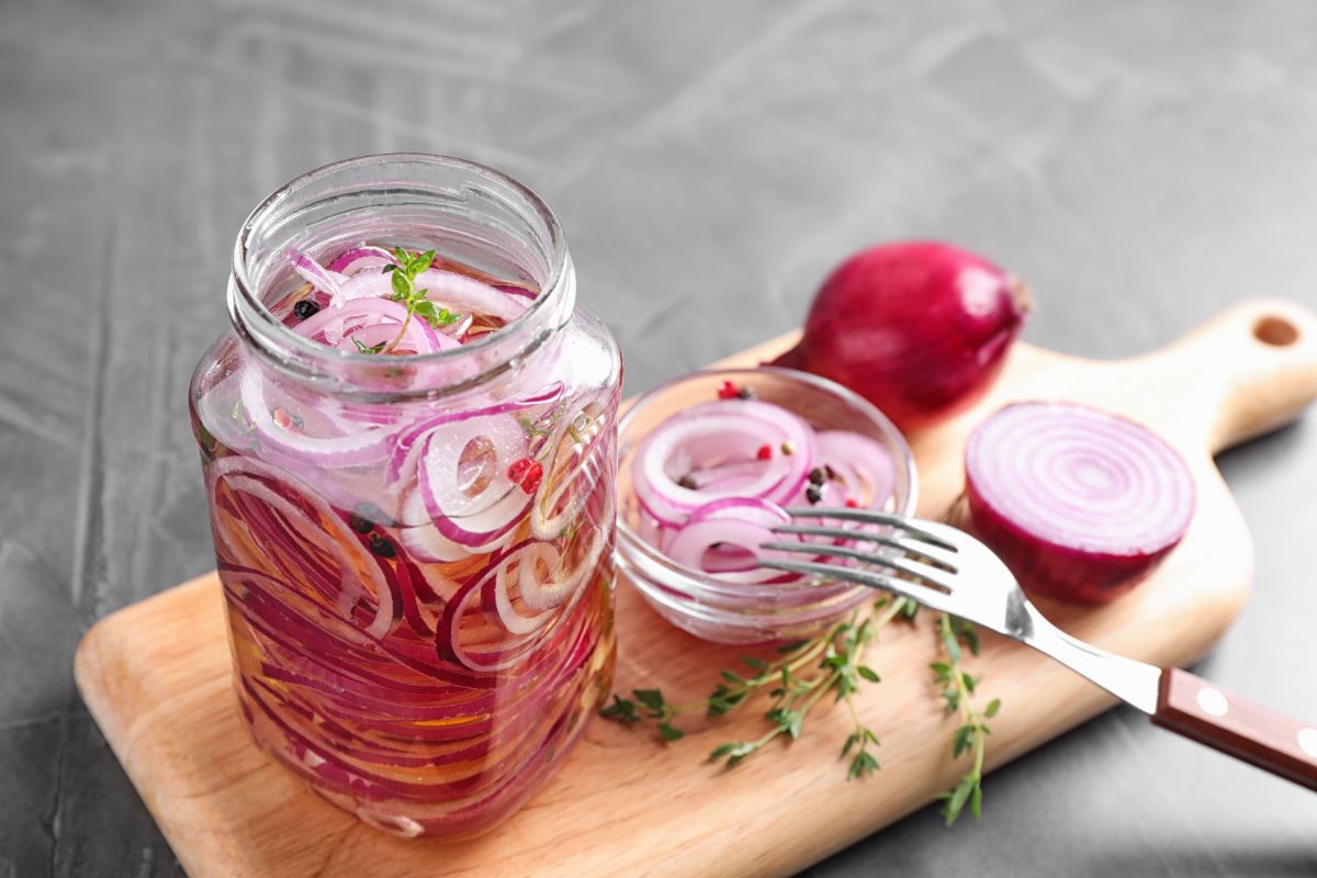 Pickled red onions in a jar