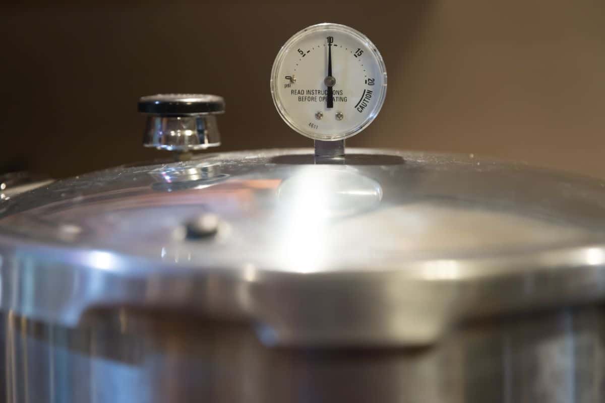 A pressure canner with a pressure gauge
