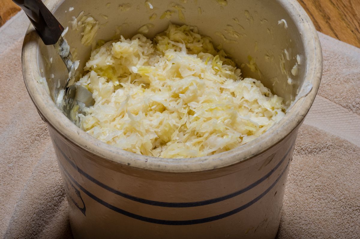 A crock with fermenting sauerkraut