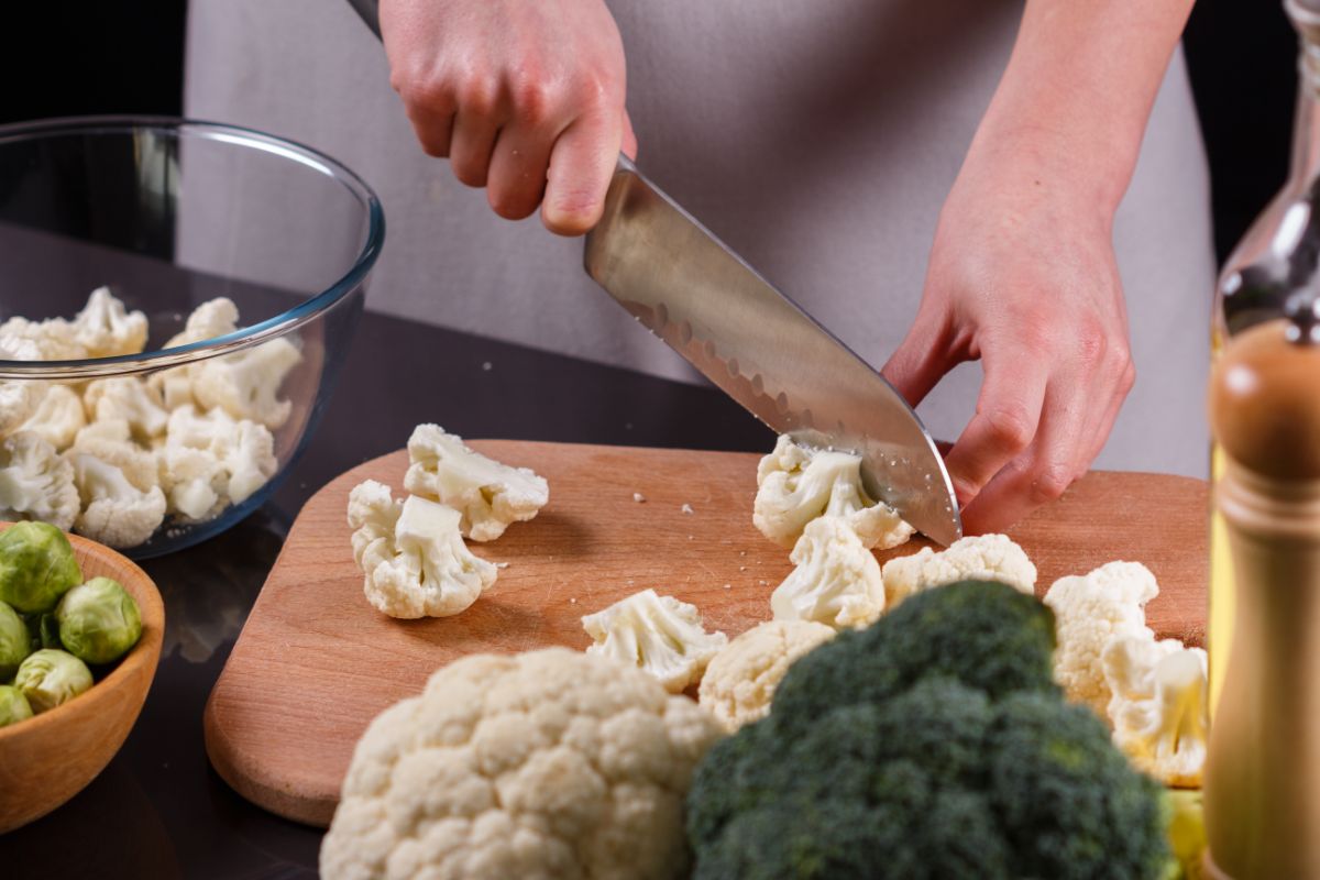 Cutting vegetables to make Giardiniera