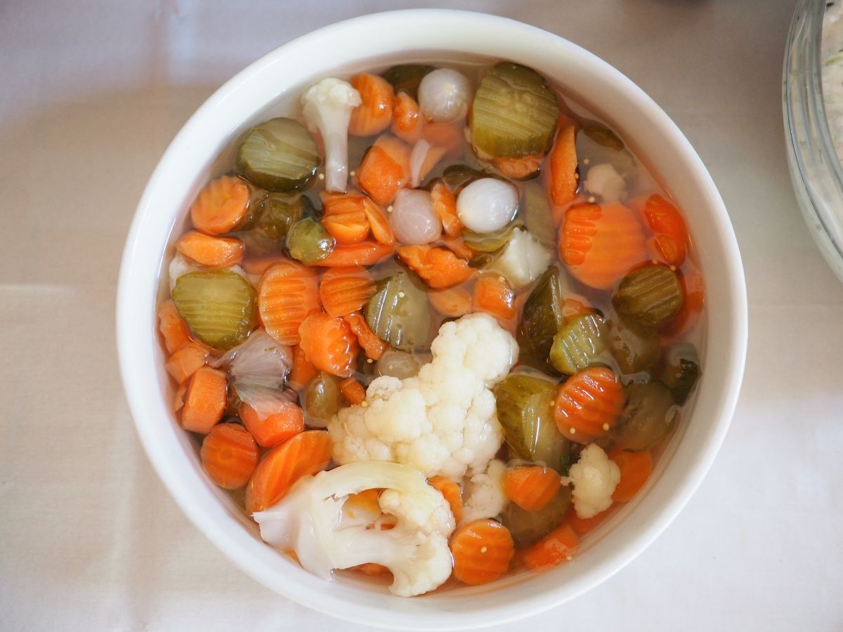 Bowl of marinating Giardiniera vegetables