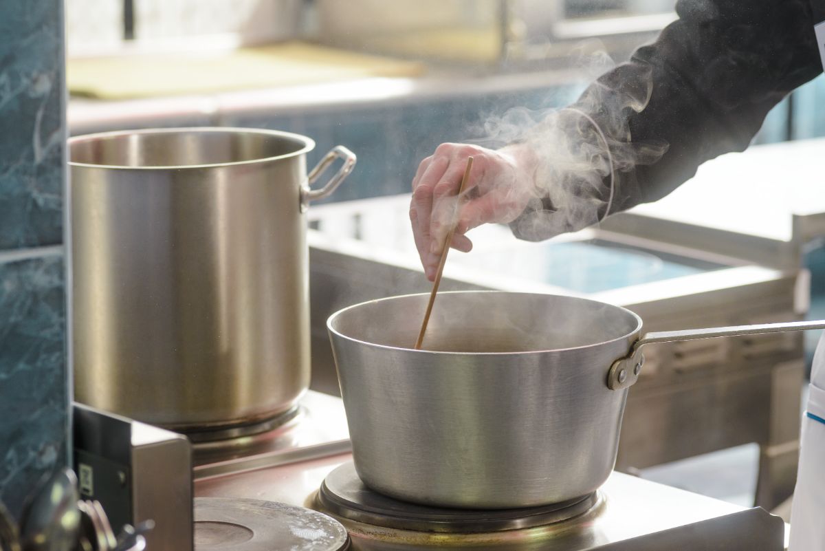 Stirring Giardiniera brine on the stove