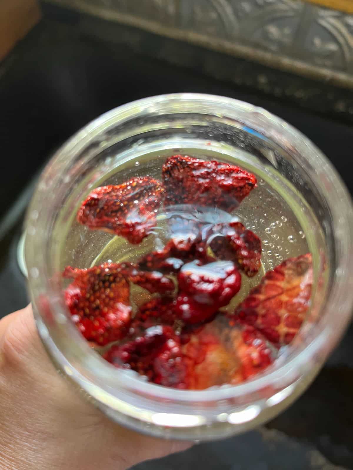 An infused water made with dehydrated strawberries