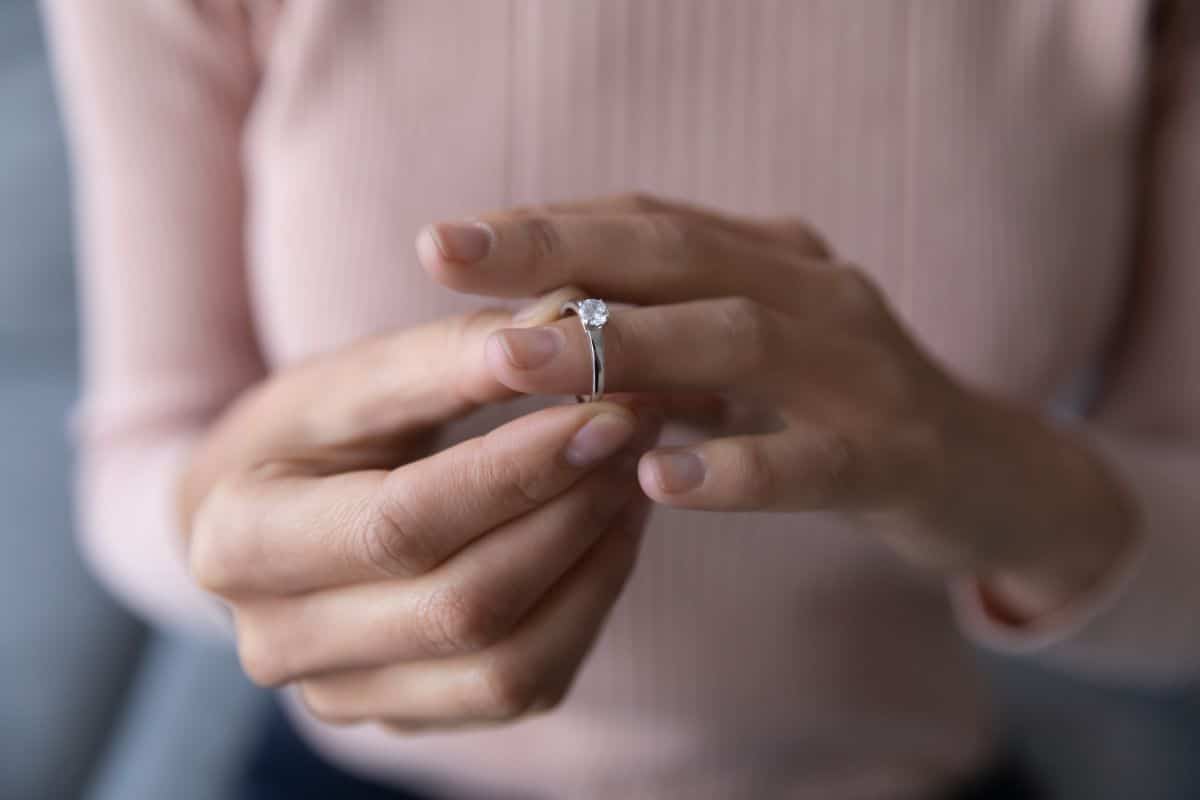 A gardener removes her ring before working in the garden