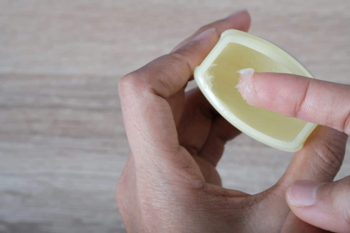 A gardener uses petroleum jelly to protect nail beds