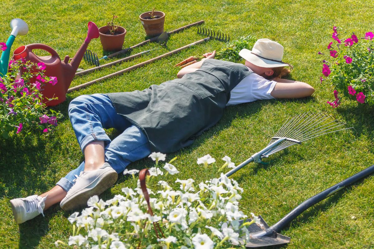 A woman takes a break in the garden, reducing repetitive stress
