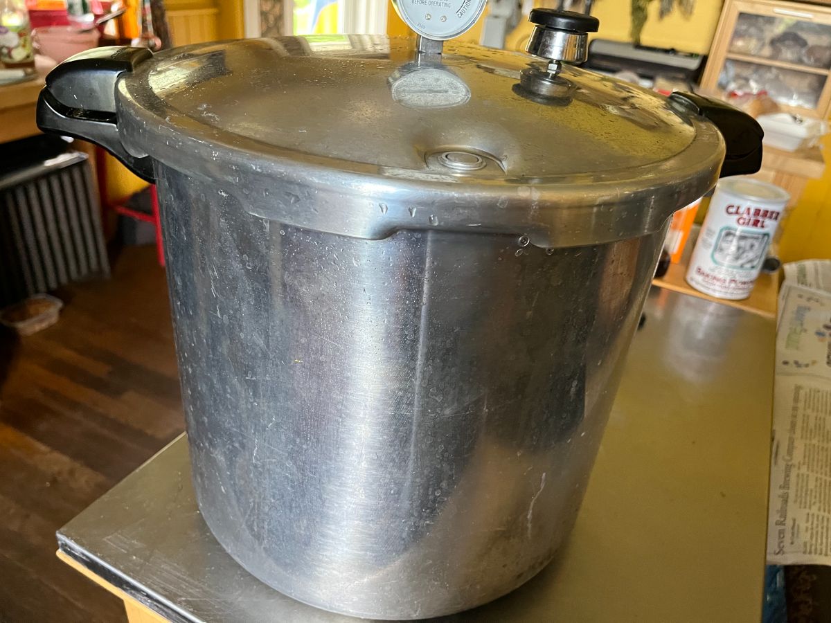 A large silver pressure canner