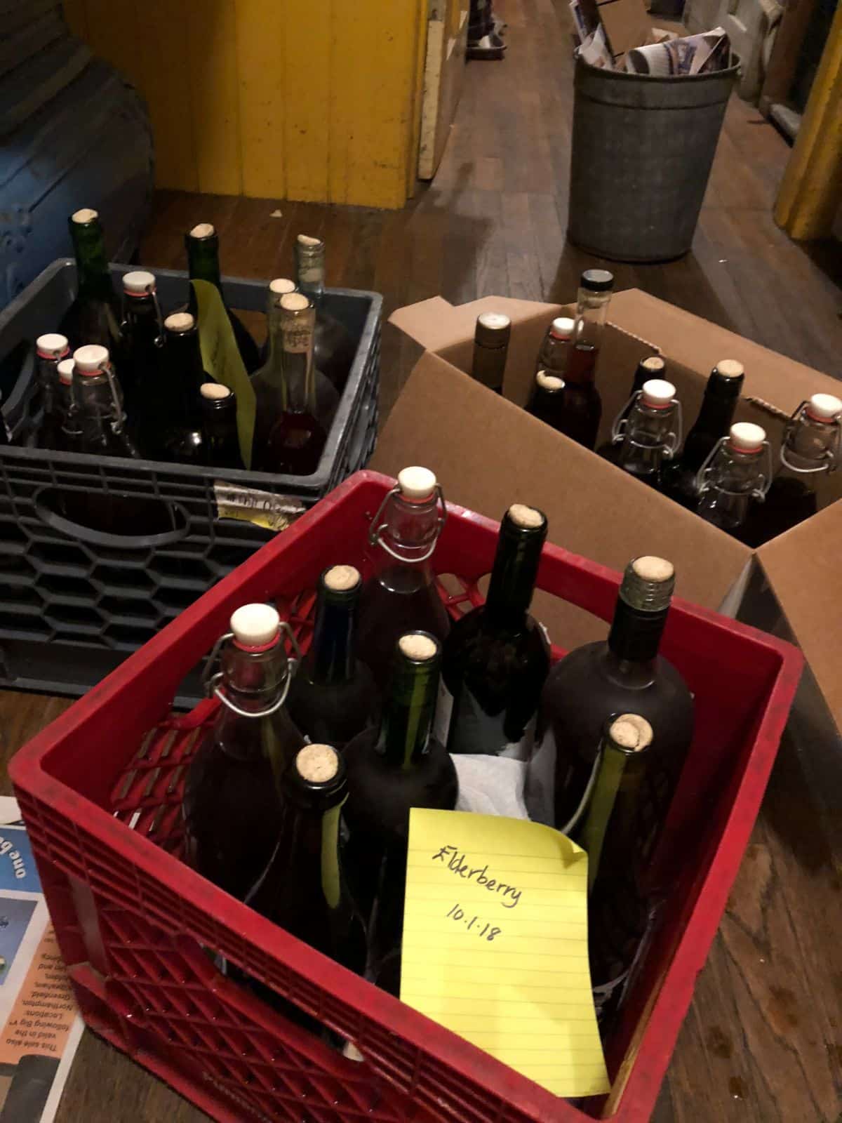 Crates of homemade elderberry wine