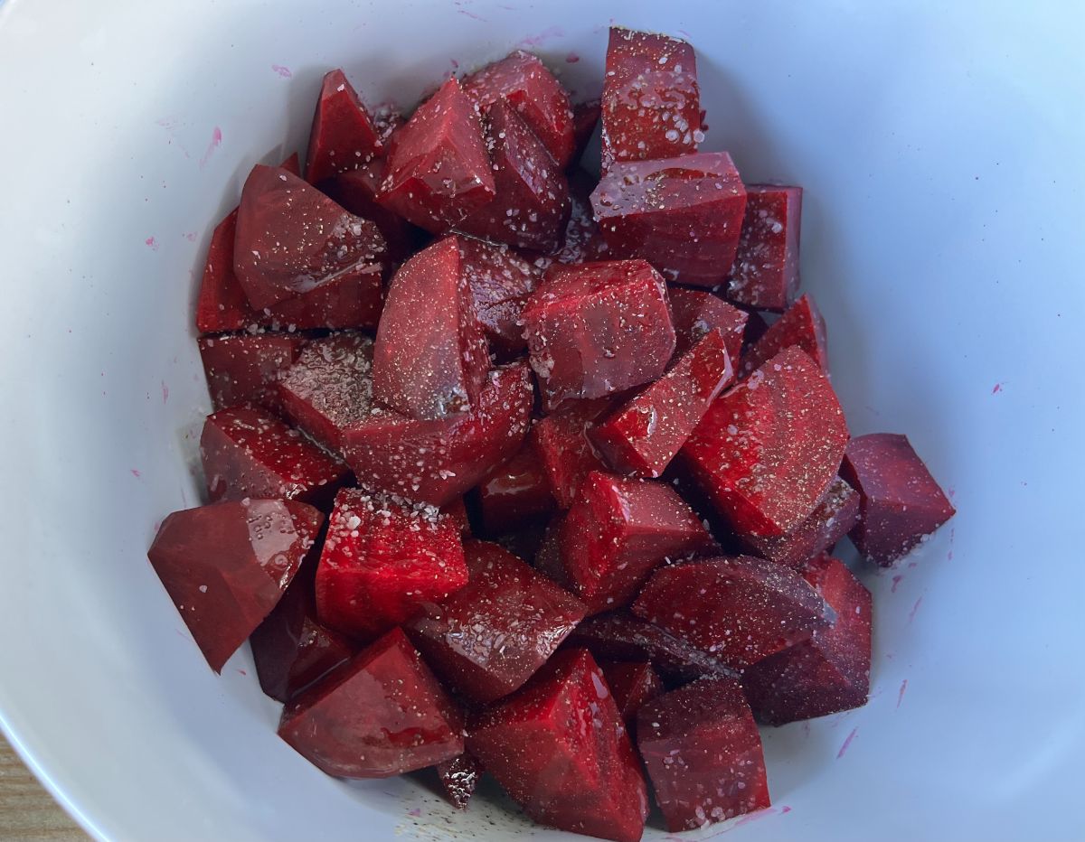 Raw seasoned beets tossed in a bowl