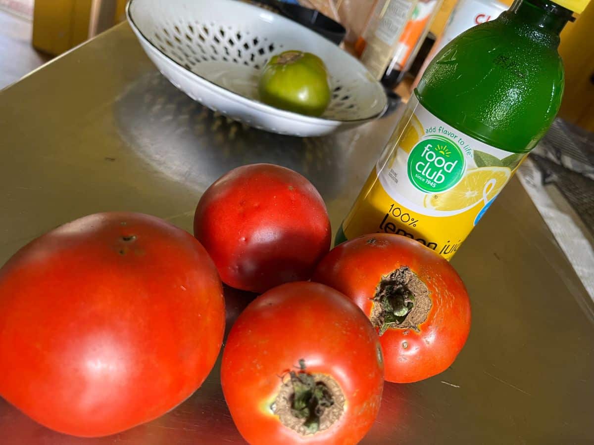 Bottled lemon juice with tomatoes for canning