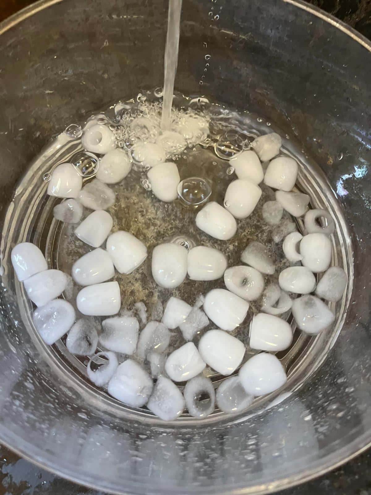 A bath of ice and water for reviving wilted lettuce