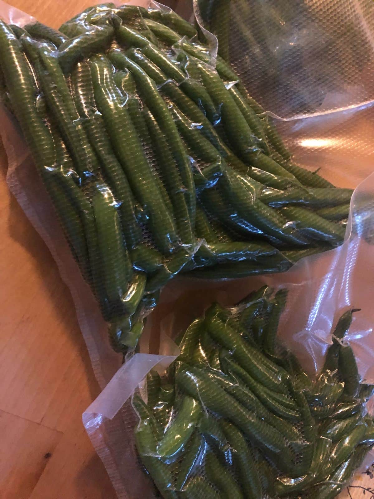 A couple packages of green beans ready to freeze