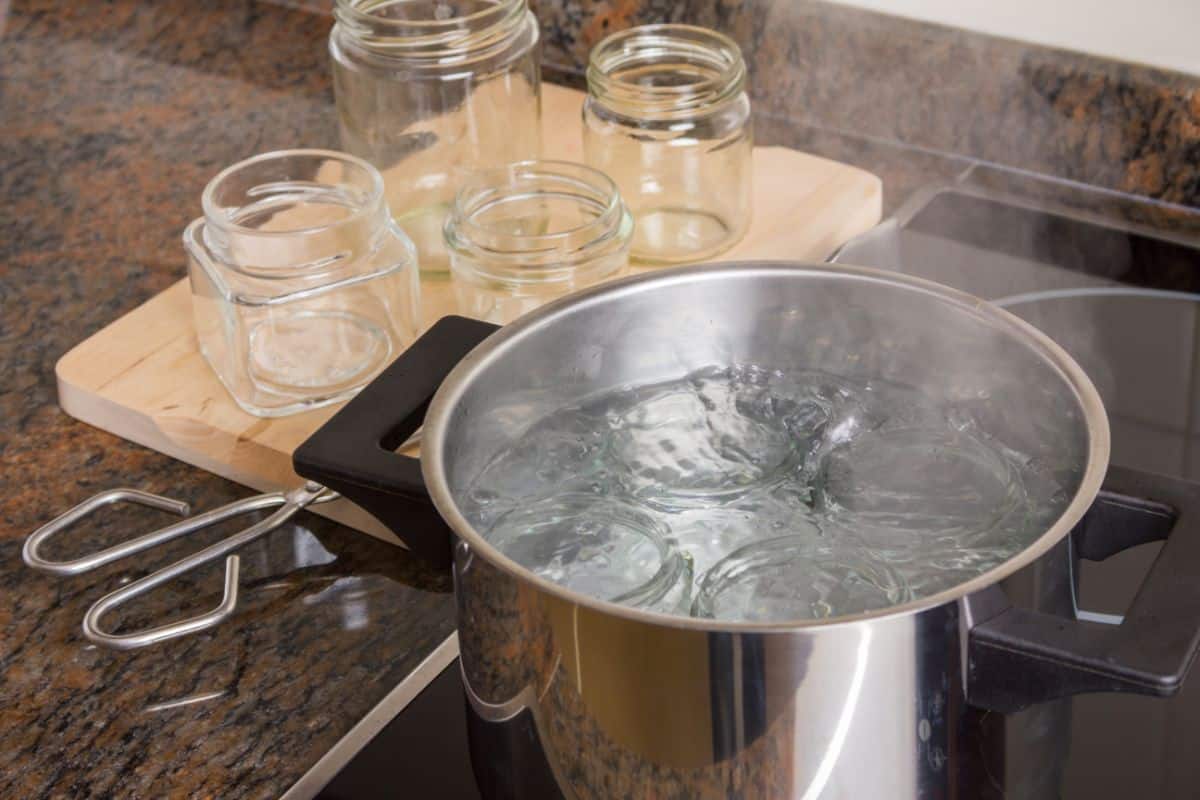 Jelly jars sterilizing in boiling water