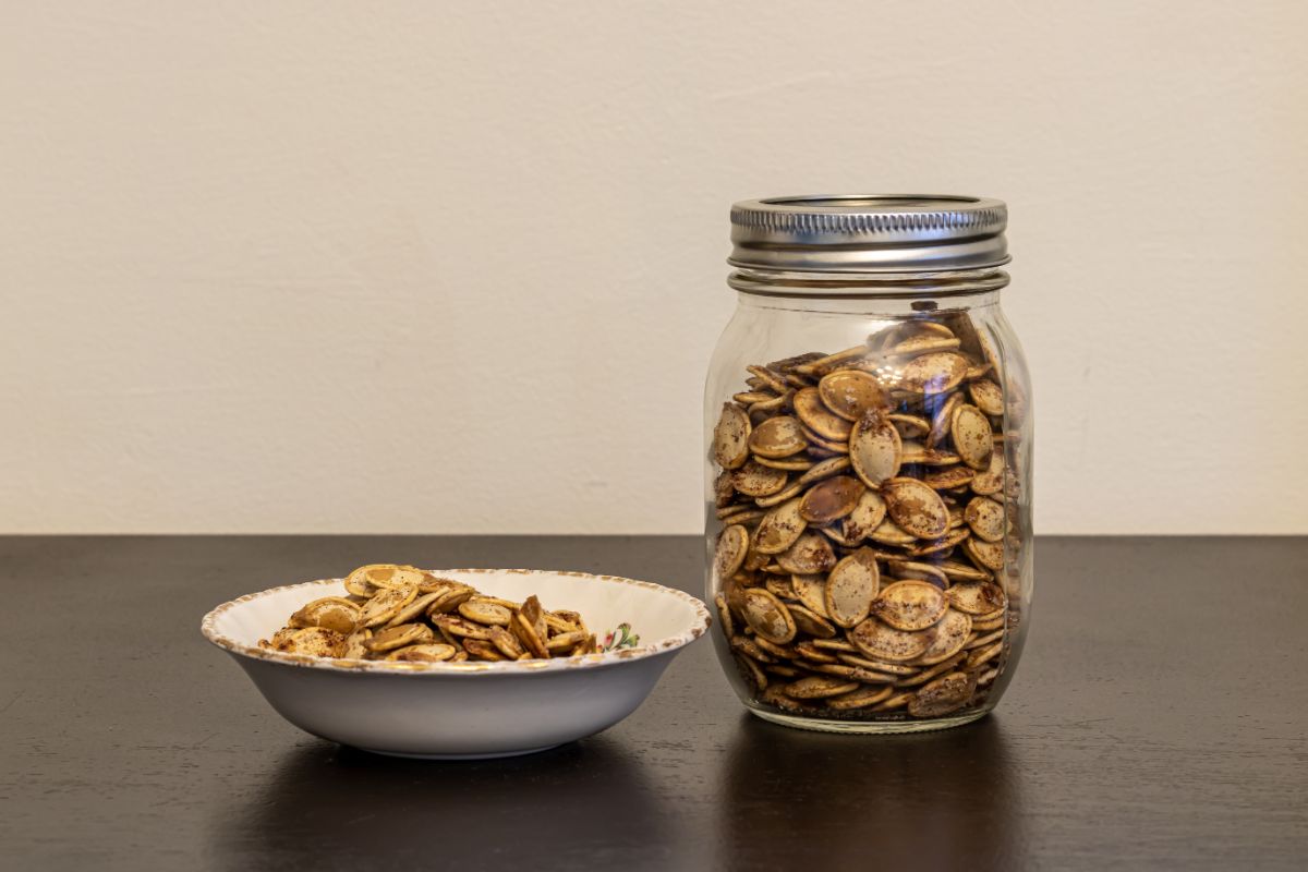 Pumpkin seeds in a mason jar to store