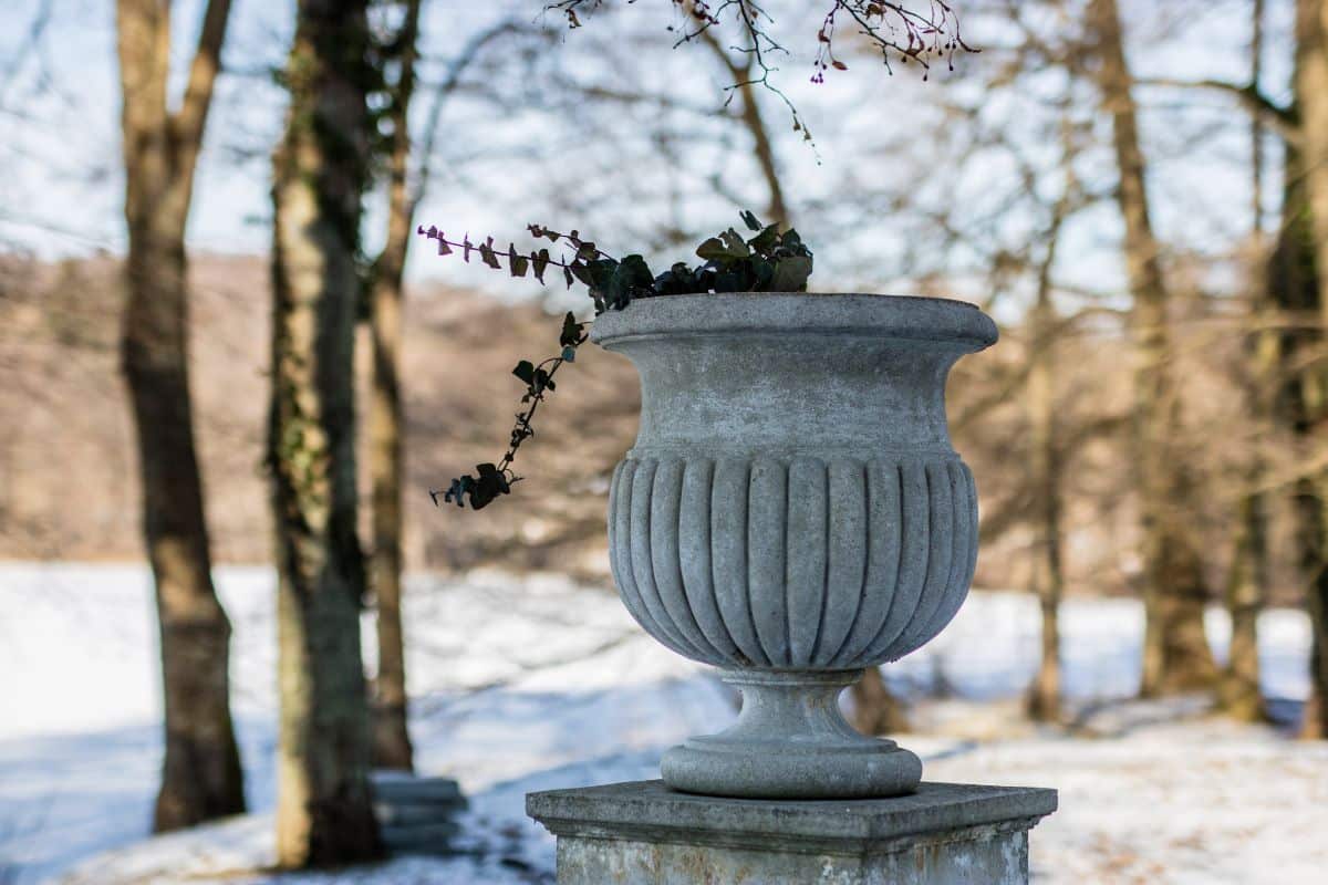 An urn made of concrete in winter