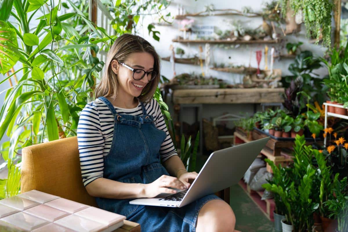A woman doing an online garden workshop