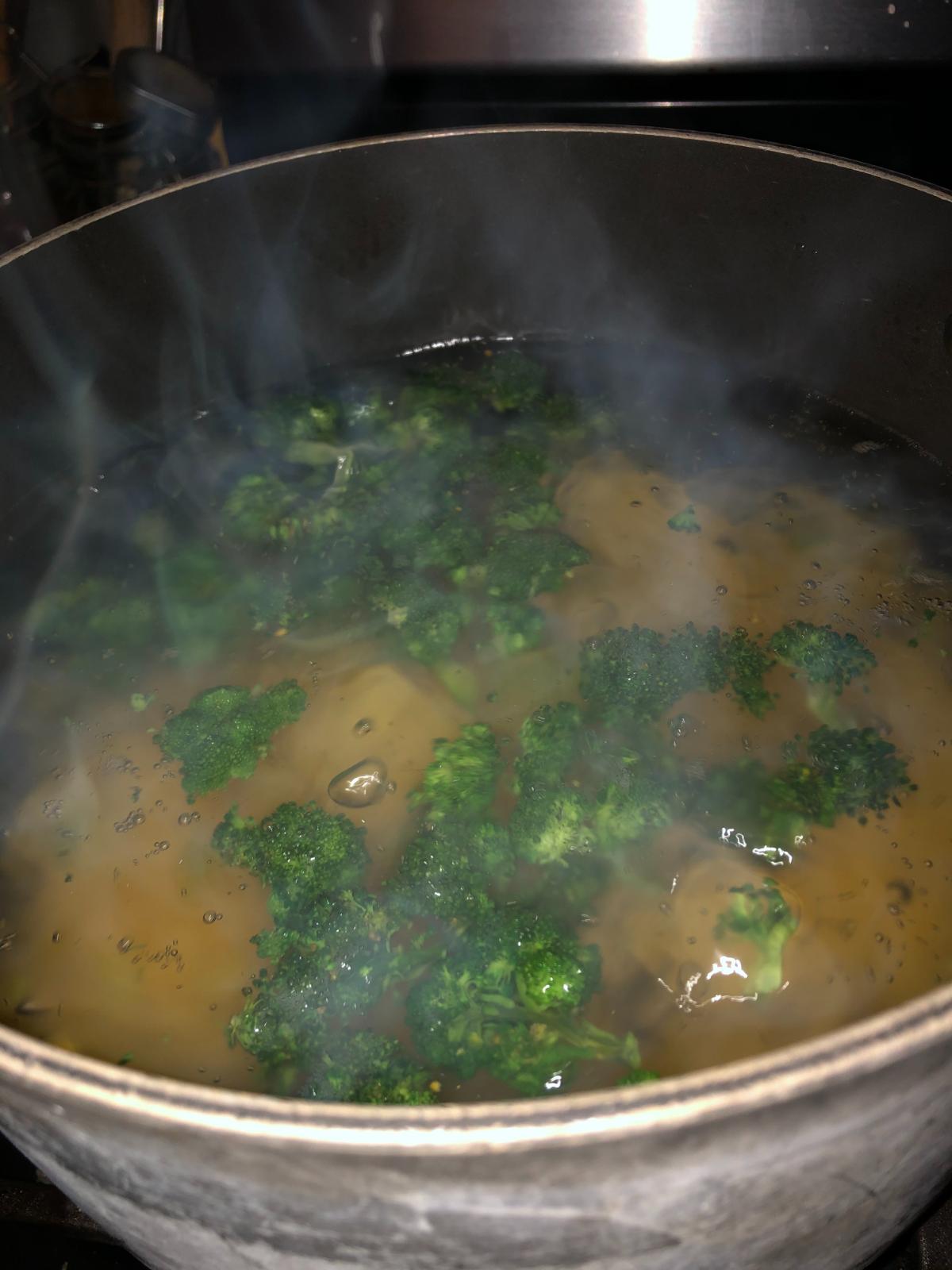 Broccoli cooking with pasta