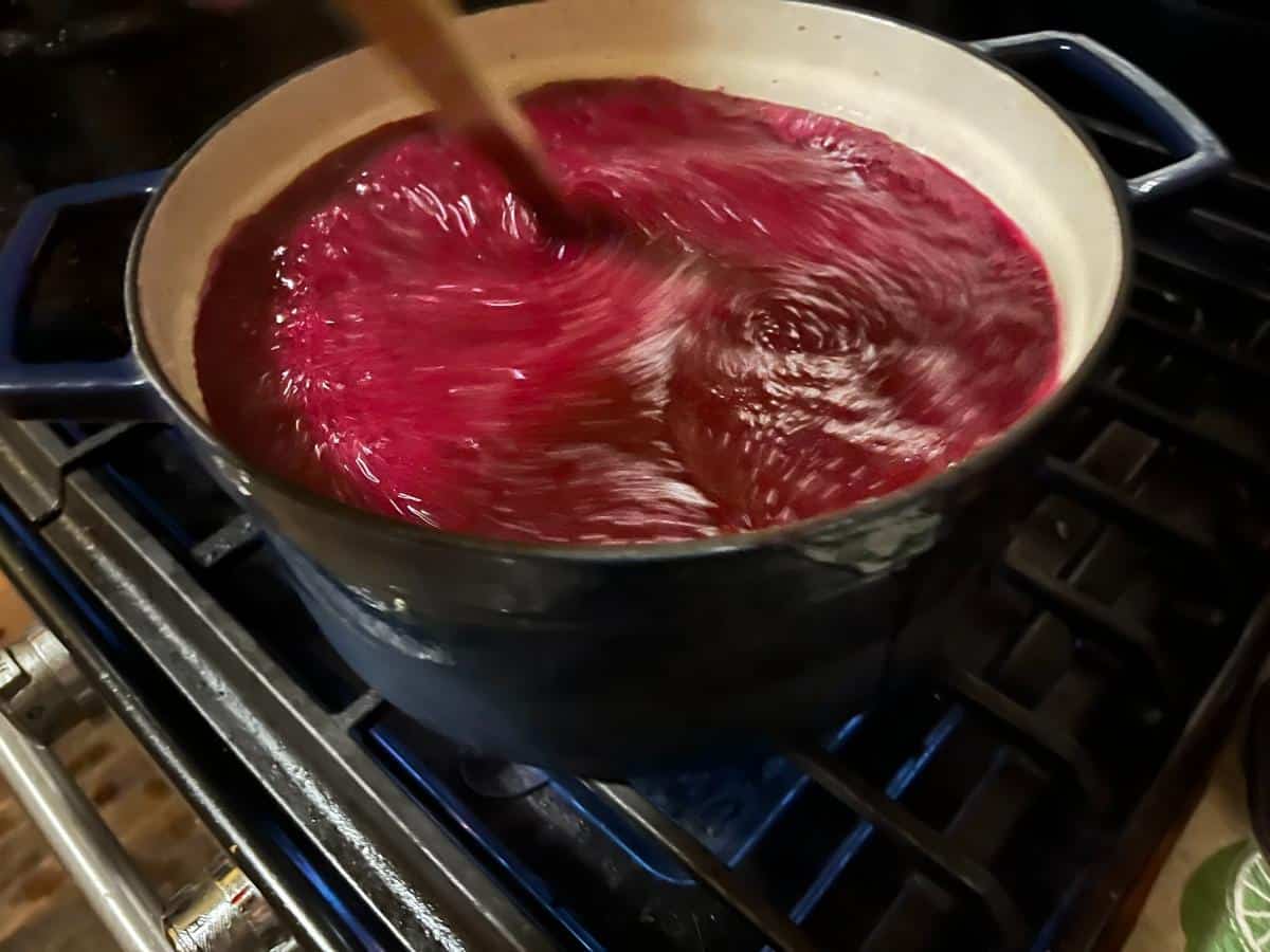 Stirring jelly at a full rolling boil