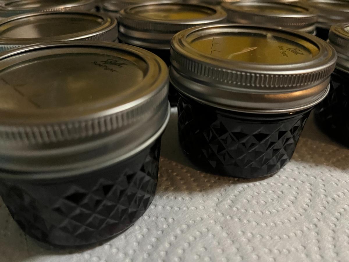 Homemade jars of elderberry jelly