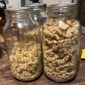 Jars full of dehydrated garlic.