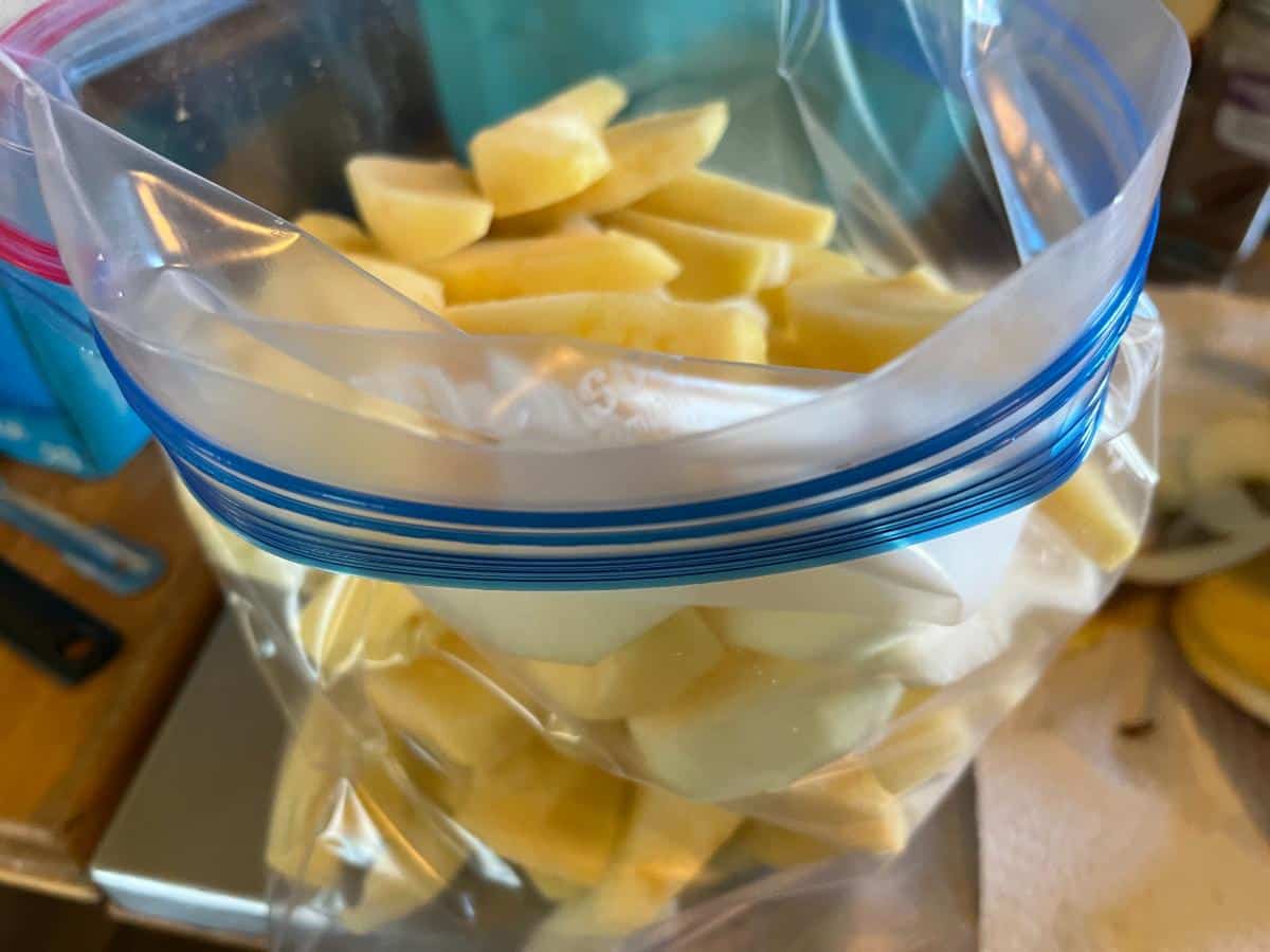 Measuring apple slices for a freezer pie filling